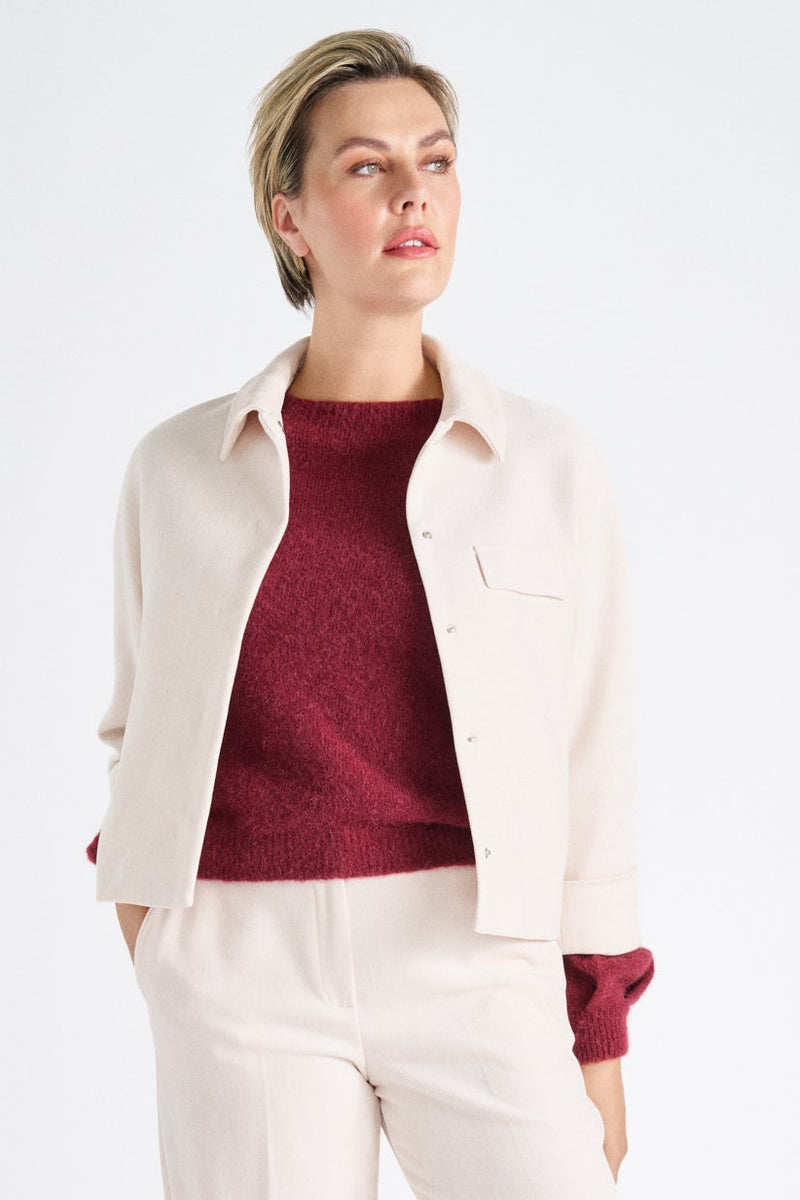 Short cream spencer with buttons and collar