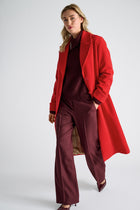 Long red coat with buttons and belt