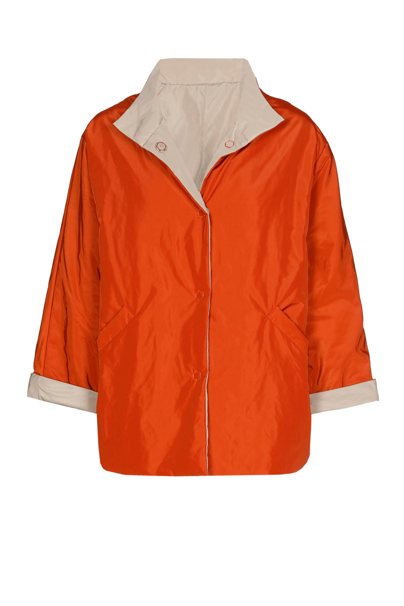 Reversible jasje in oranje en beige