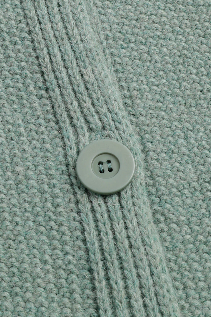 Cape verte avec boutons