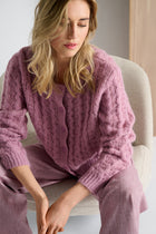 Roze cardigan met ronde hals en knoopsluiting