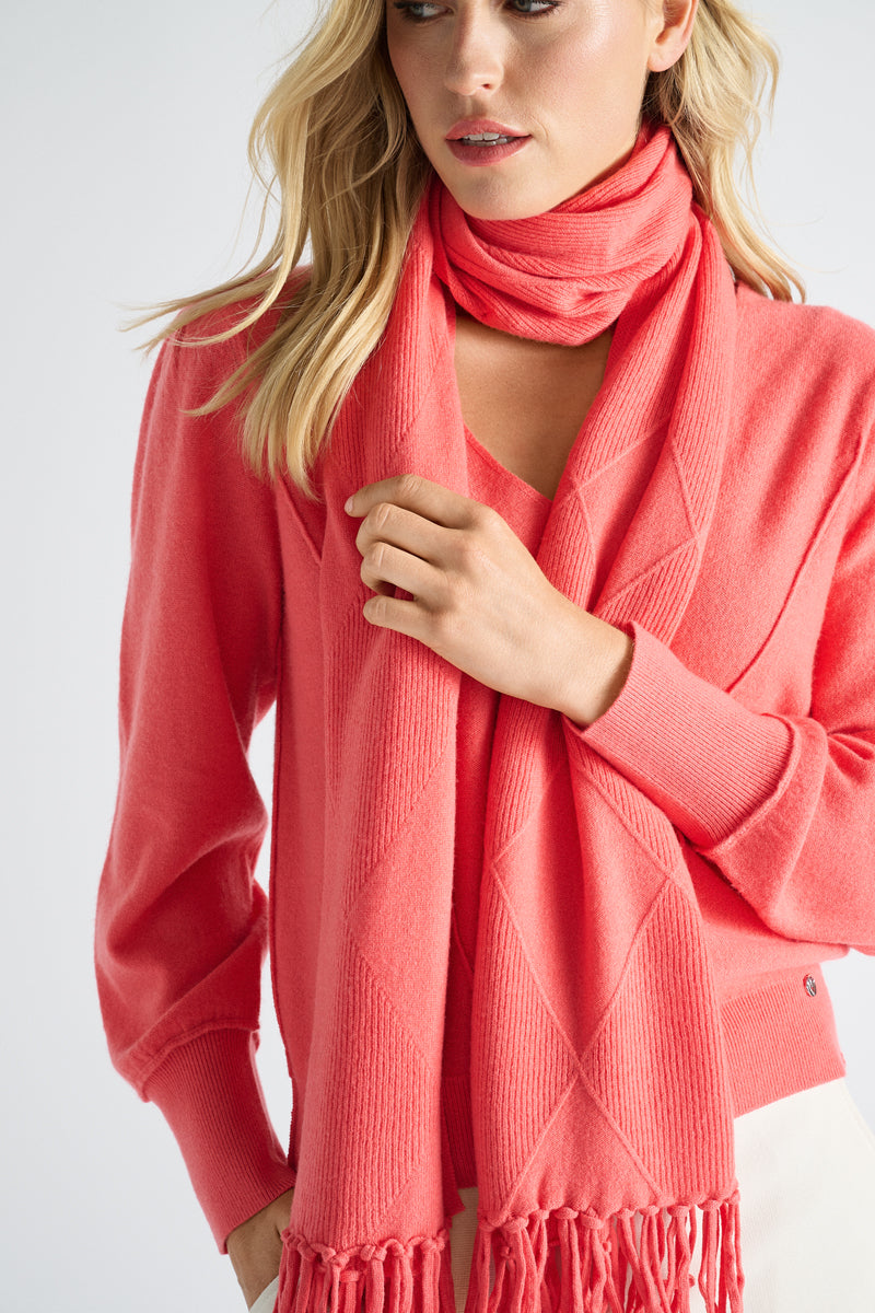 Koraalkleurige pull met v-hals