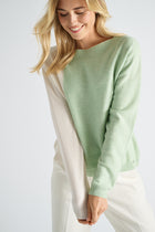 Pull bicolor met verticale streep in mintgroen en ecru