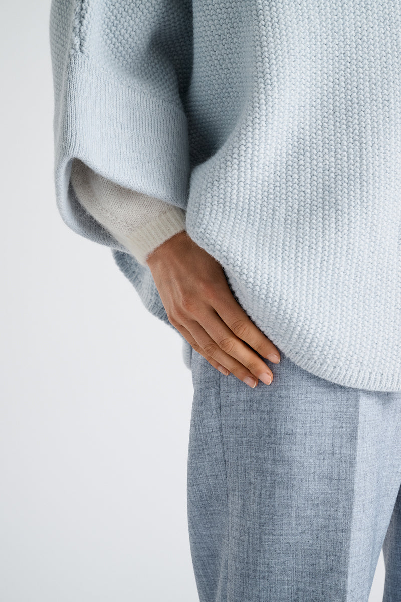 Cape bleu ciel avec boutons