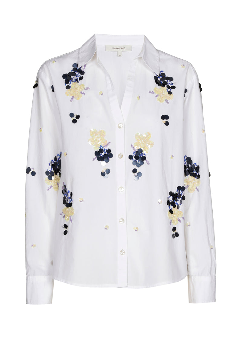 White blouse with blue sequins