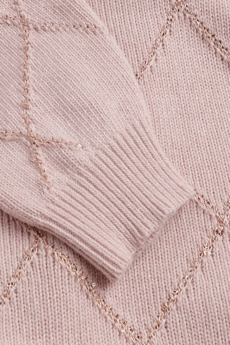 Pull rose avec motif à carreaux