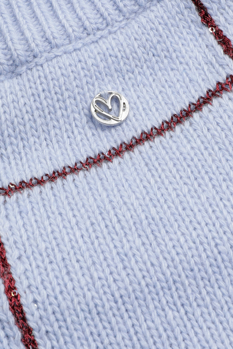 Lichtblauwe pull met bordeaux ruiten