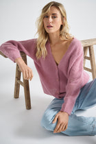 EXCLUSIVE IN OUR CONCEPT STORES: Pink cardigan with button closure