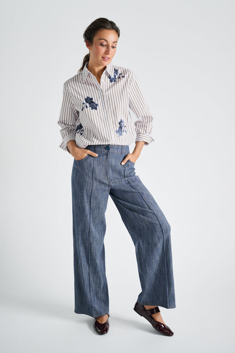 Light blue blouse with embroidery