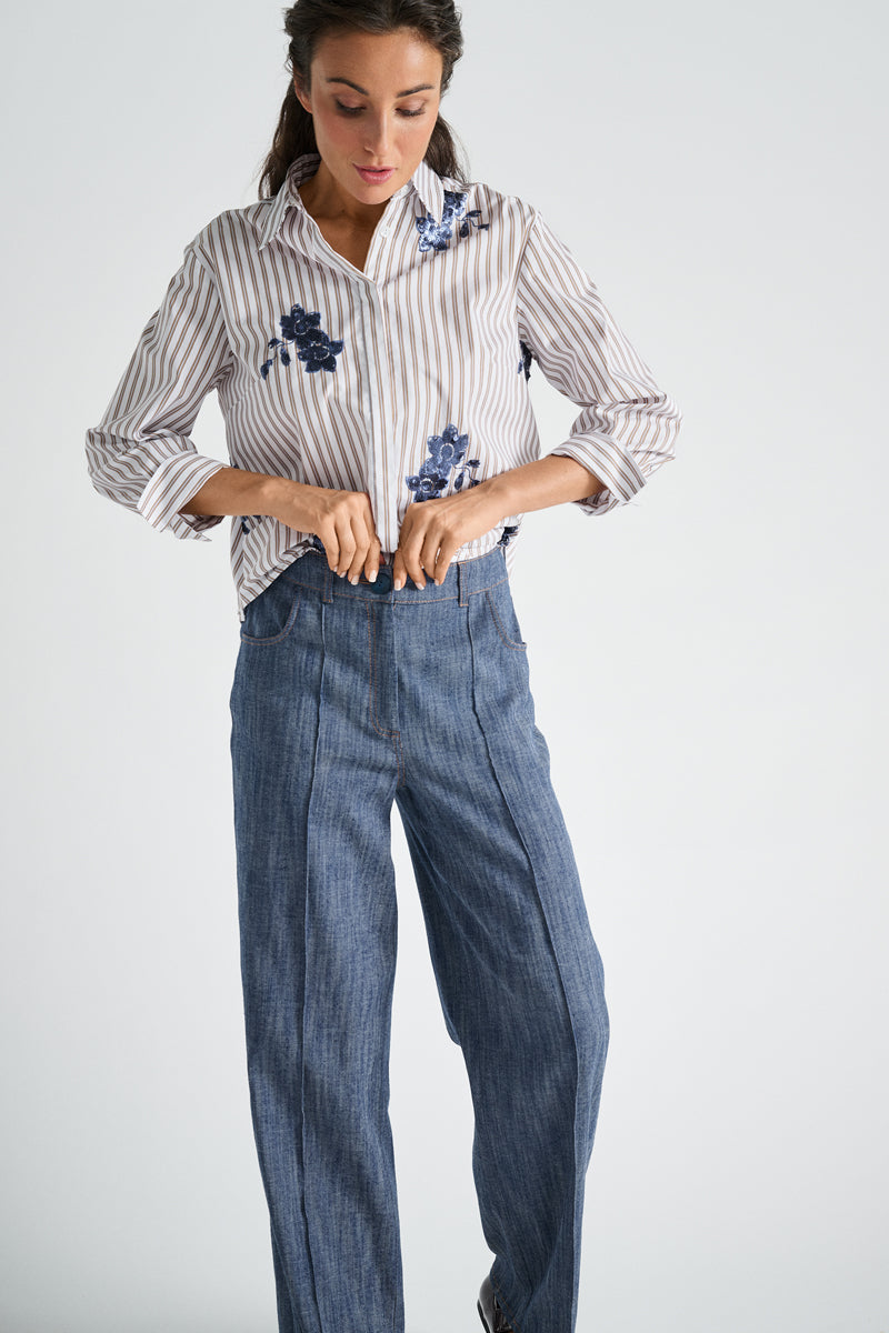 Light blue blouse with embroidery