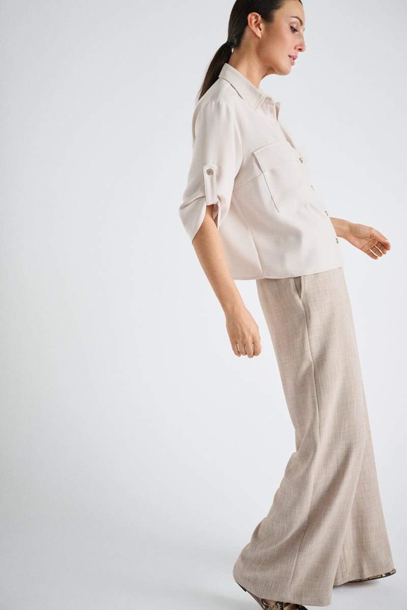 Beige shirt with sleeve loops