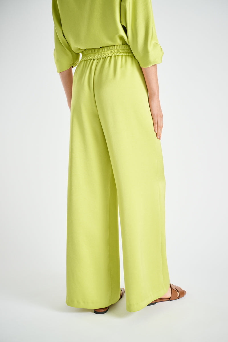 Wide lime green trousers in satin look