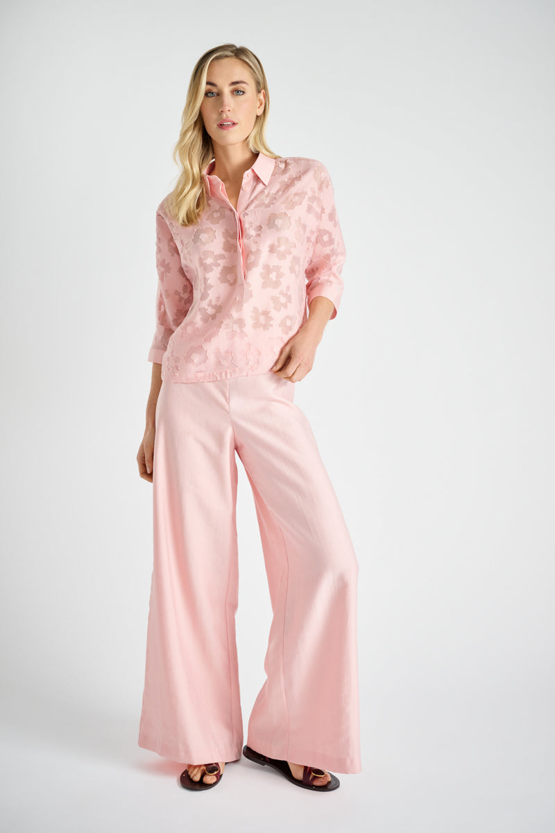 Pink polo shirt with transparent flowers