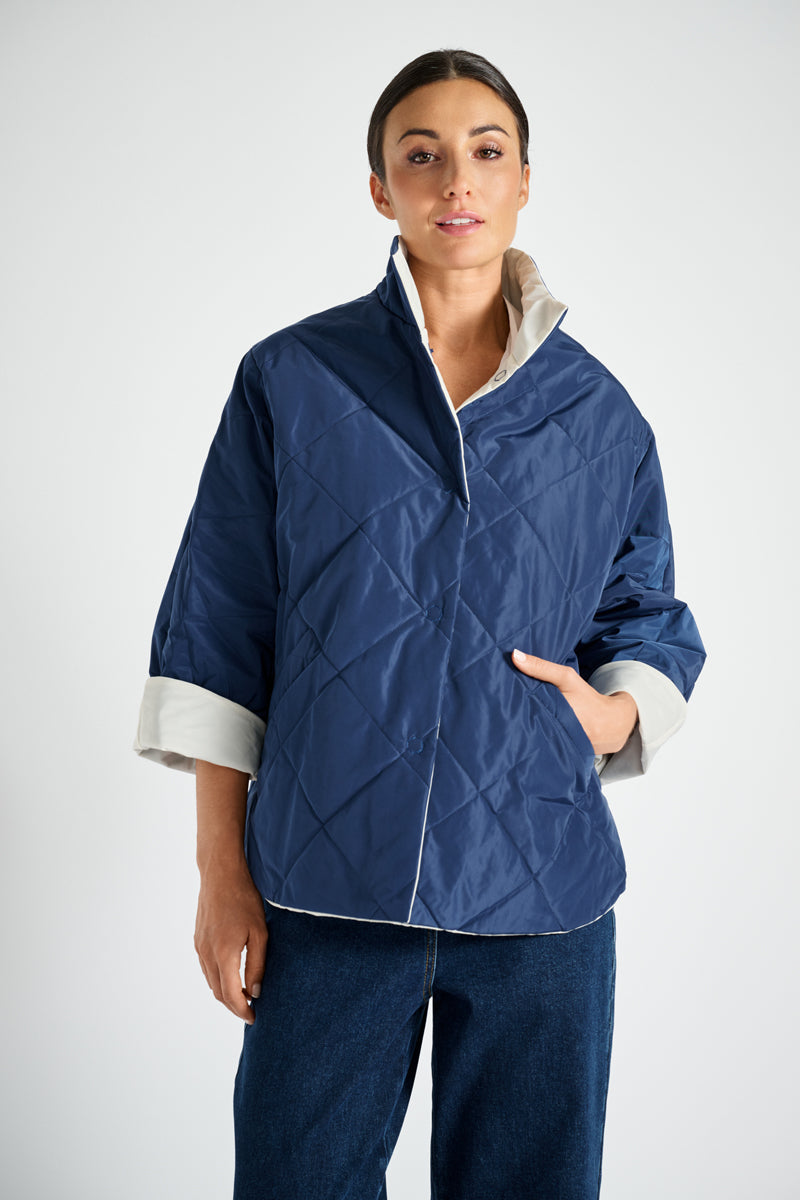 Reversible jacket in navy blue and white