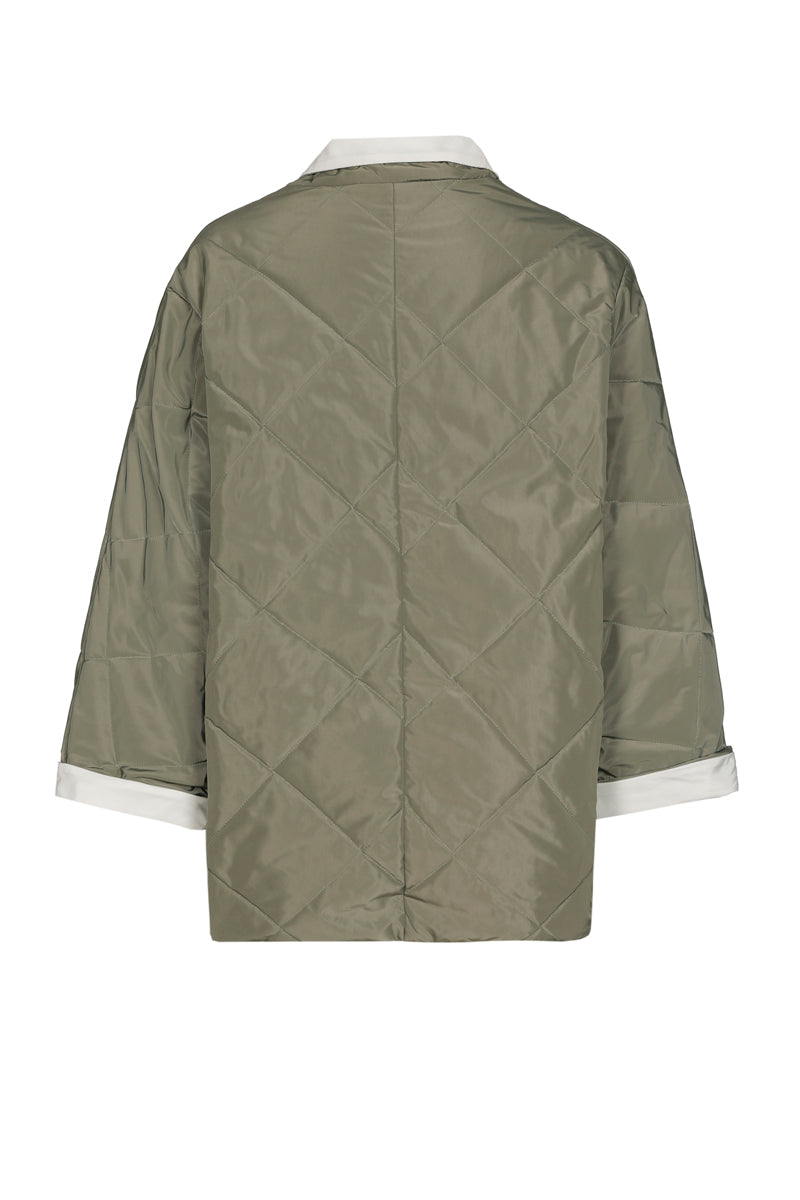 Veste réversible avec étouffement comme détail kaki et blanc