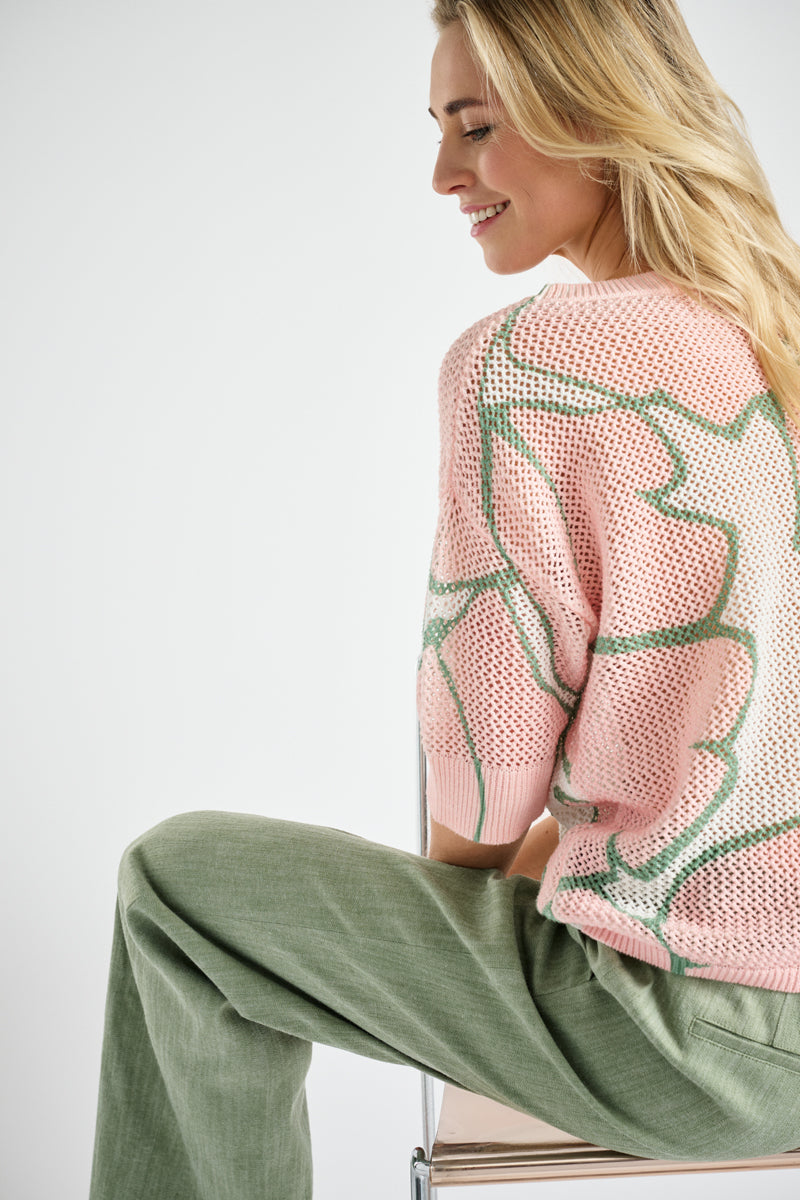 Crochet sweater with pink print