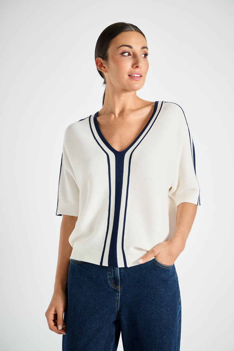 Ecru sweater with navy striped pattern