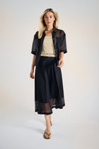 Beige mouwloze top