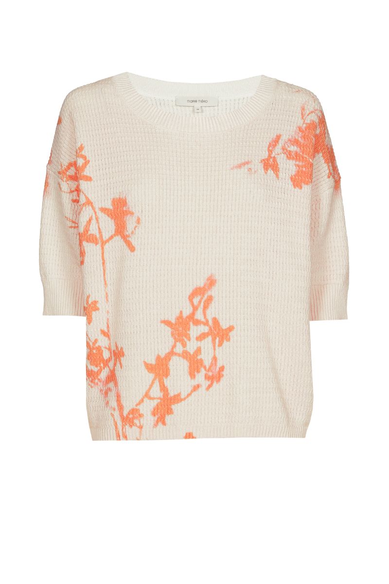 Pull couleur crème avec fleur orange