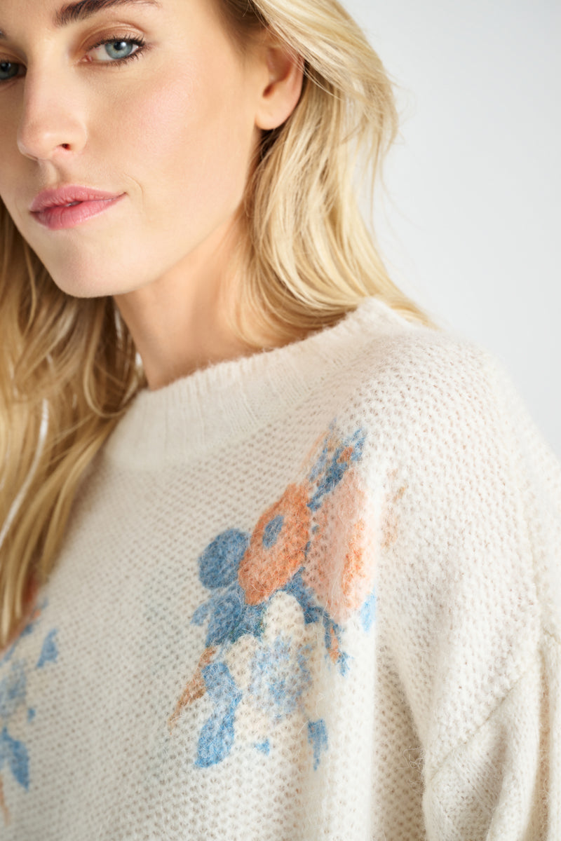 Pull ample crème avec imprimé fleuri