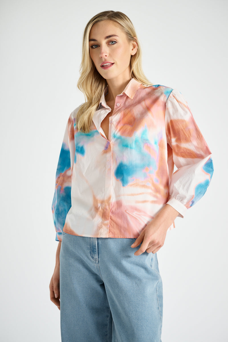 Pink shirt with blue printed flowers
