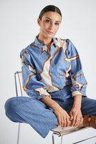 Blouse en coton à fleurs avec manches bouffantes