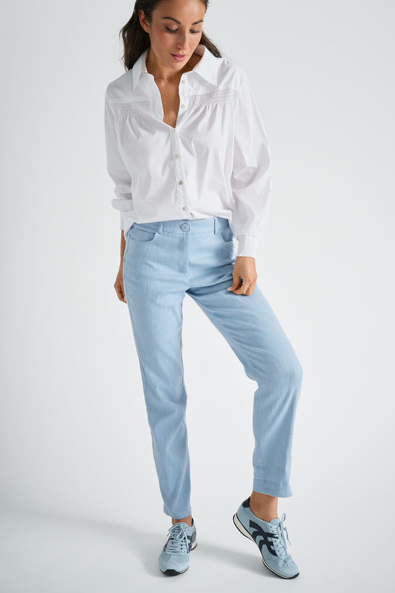 Slim fit denim blue trousers in cotton blend