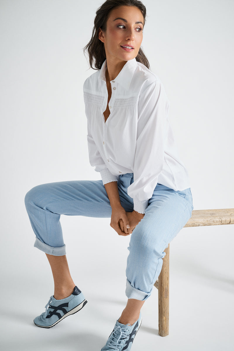 Slim fit denim blue trousers in cotton blend