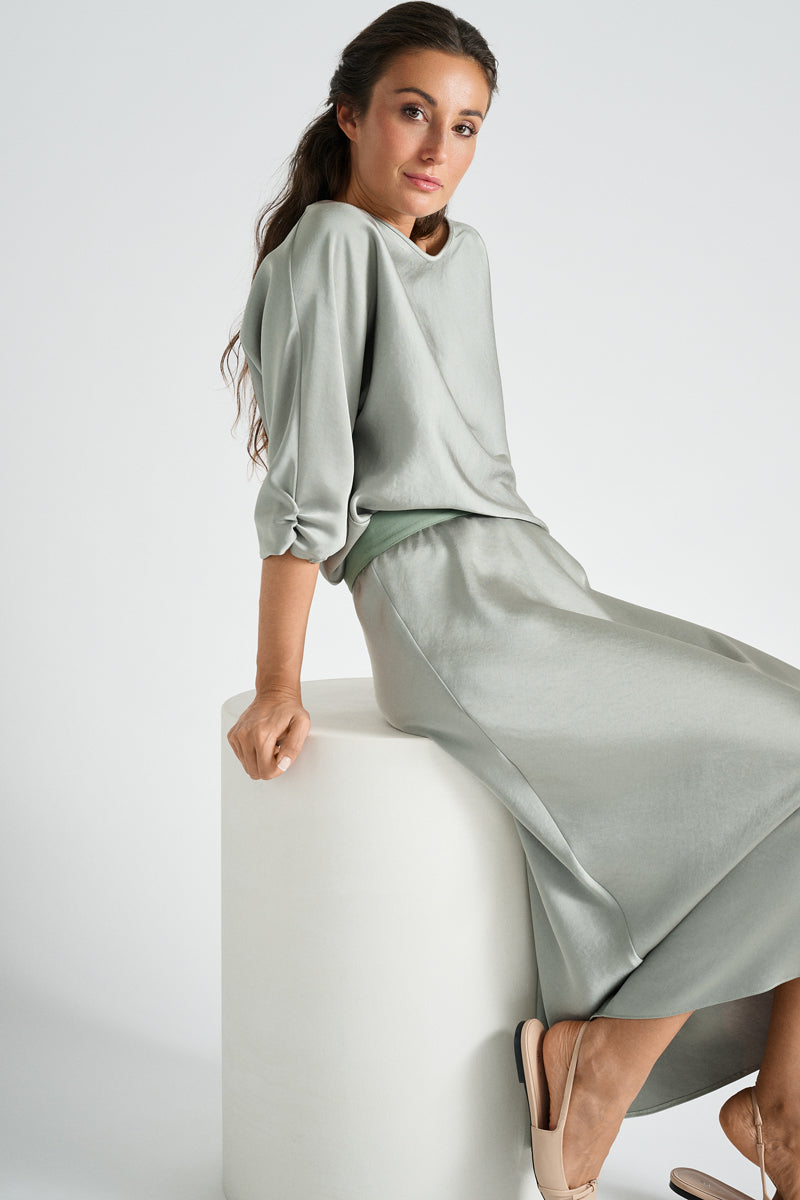 Light green blouse in satin