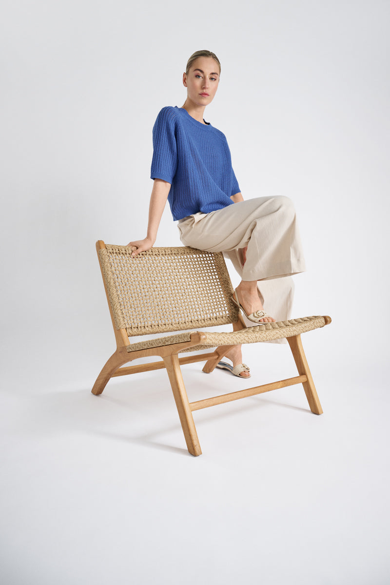 Crocheted jumper with a round neck and short sleeves