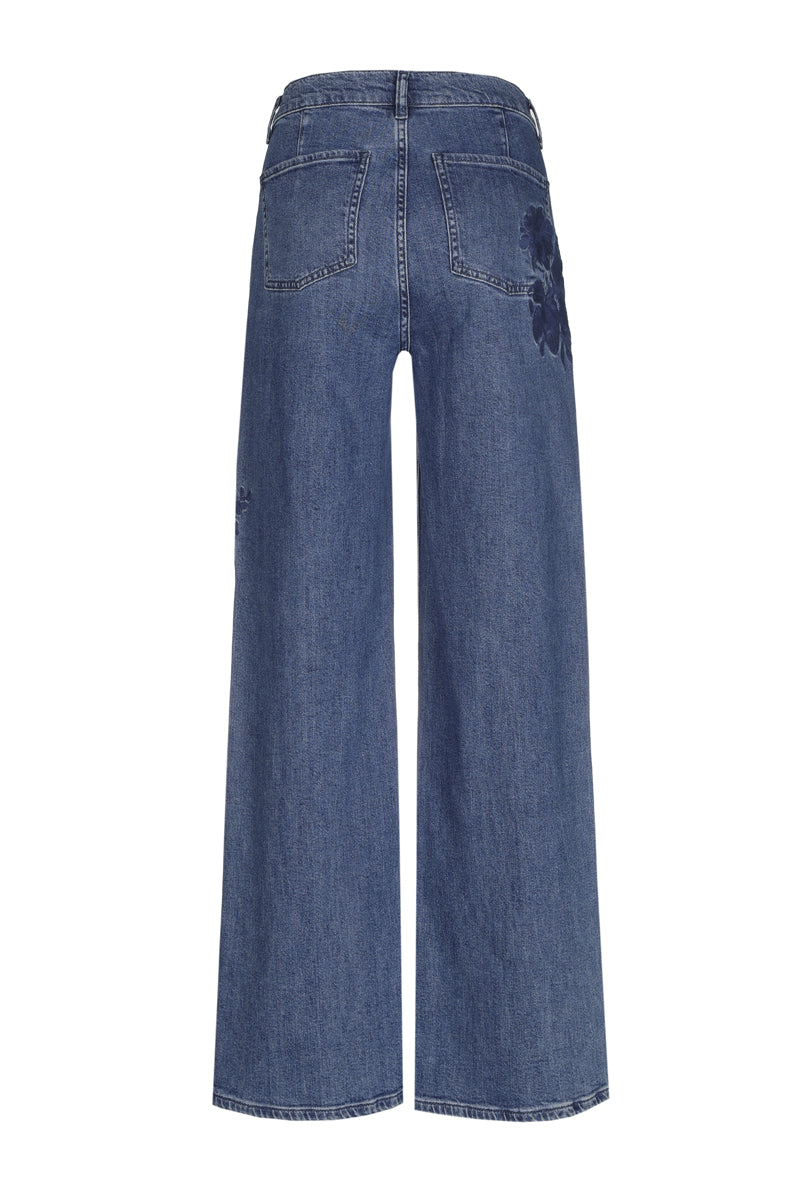 Wide jeans with embroidered flower on leg