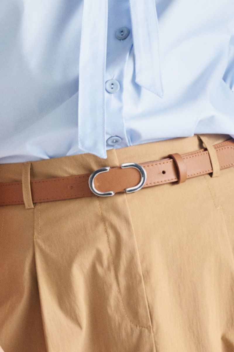 Brown belt with golden buckle