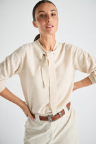 Fine ecru cashmere-wool sweater with bow collar