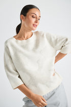 Pull ample crème à motif jacquard