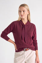 Fine red cashmere-wool sweater with bow collar