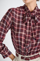 Red belt with golden buckle