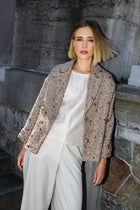 Veste courte brune à paillettes