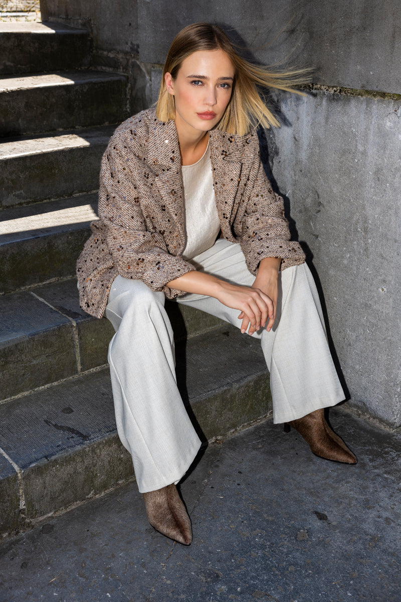 Veste courte brune à paillettes