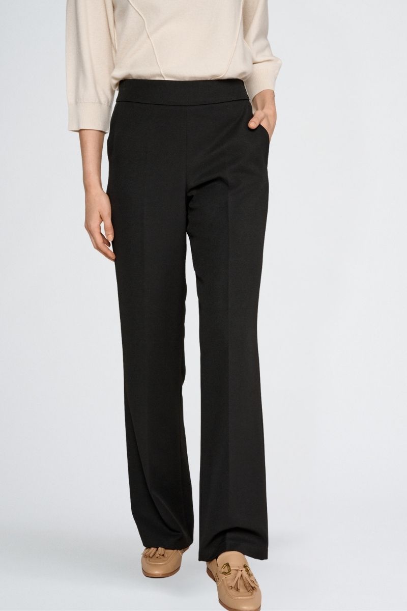 Wide black trousers and elastic waist