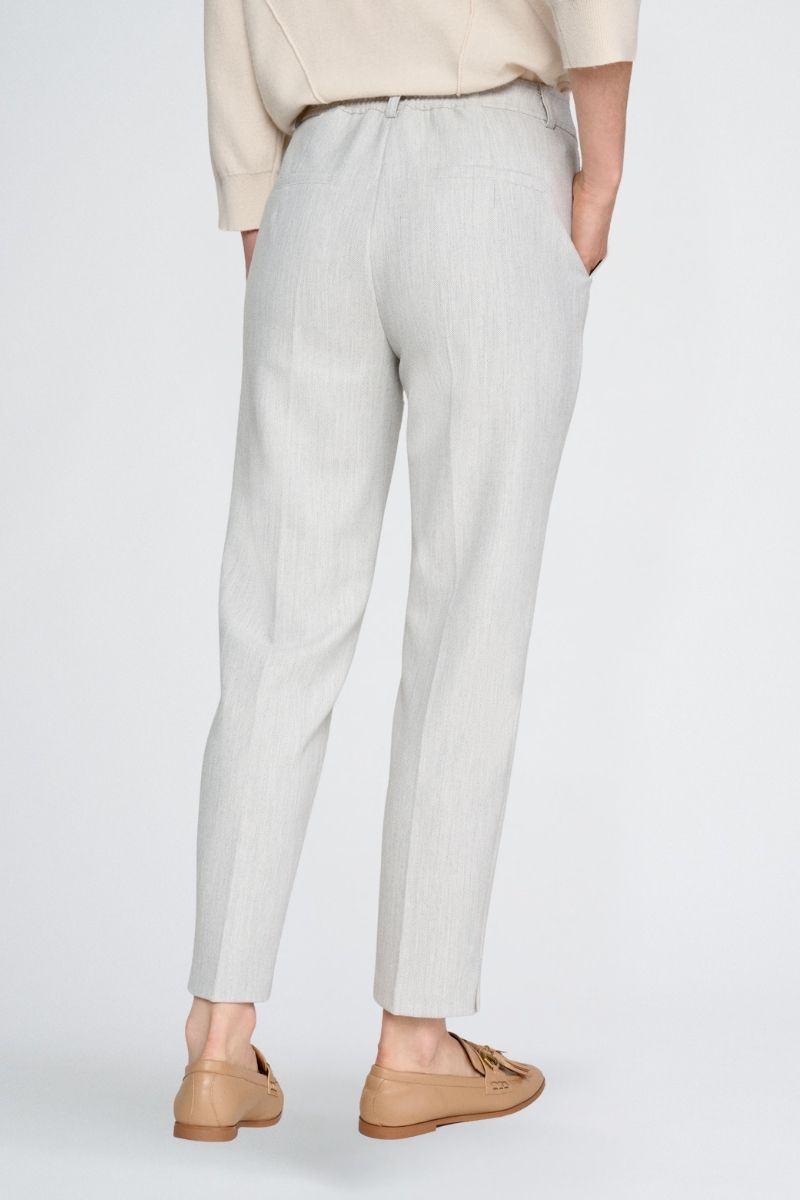 Pantalon 7/8 gris et élastique à l’arrière de la taille