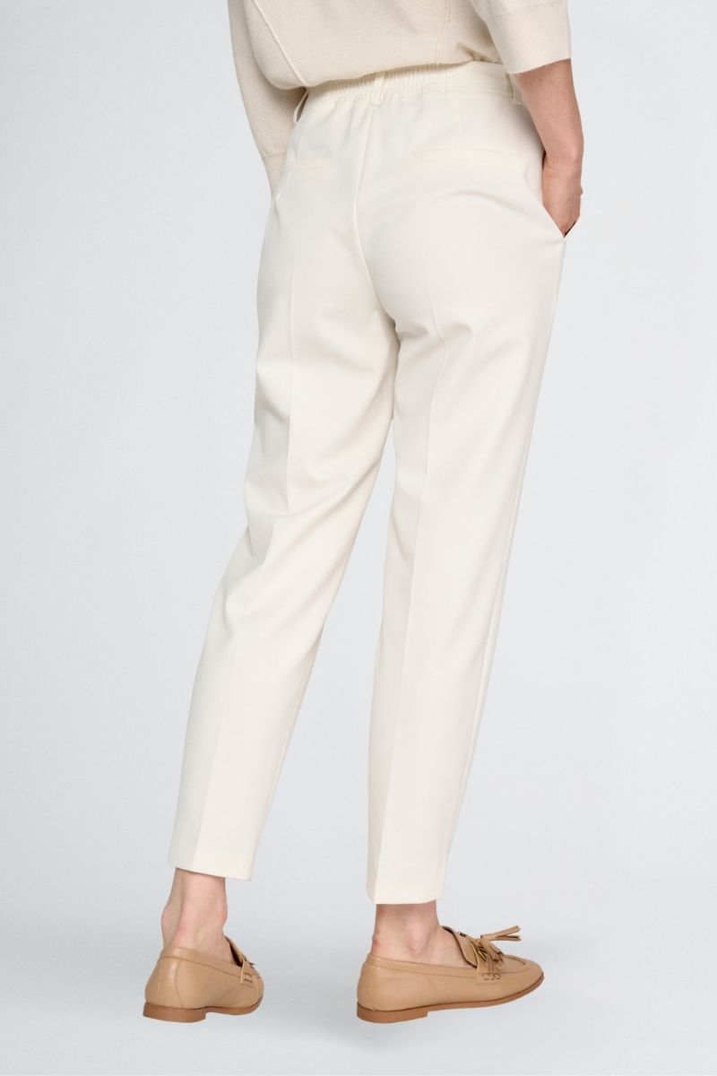Pantalon 7/8 en blanc cassé avec élastique à l’arrière de la taille