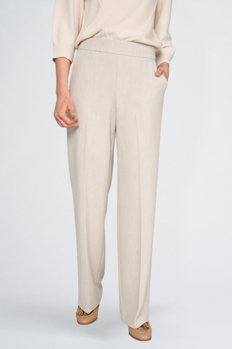 Pantalon large beige et élastique à l’arrière de la taille