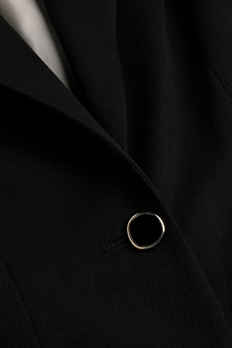 Blazer noir ajusté pour toutes les occasions